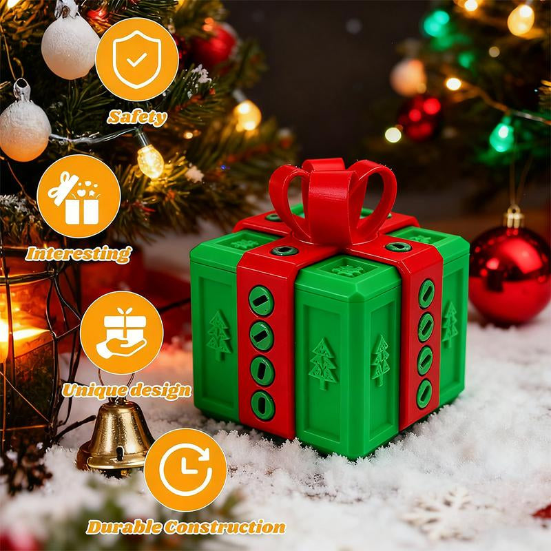 Green and red Christmas gift box puzzle on snow with decorated tree and holiday lights